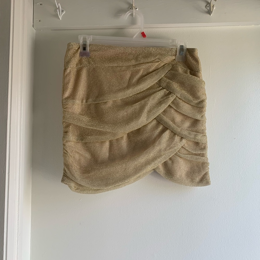 Gold sparkly mini skirt